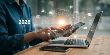 Mastering Time: Boost Your Productivity with Daily Hacks for 2026 Person efficiently managing tasks on laptop and tablet, glowing with productivity in a modern workspace.