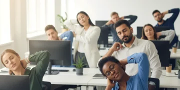 Office workers performing desk stretches to relieve neck pain